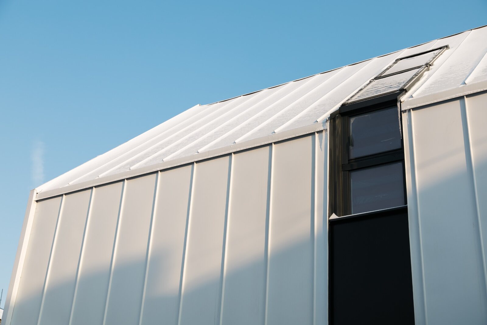 Standing seam metal roofing on a modern building
