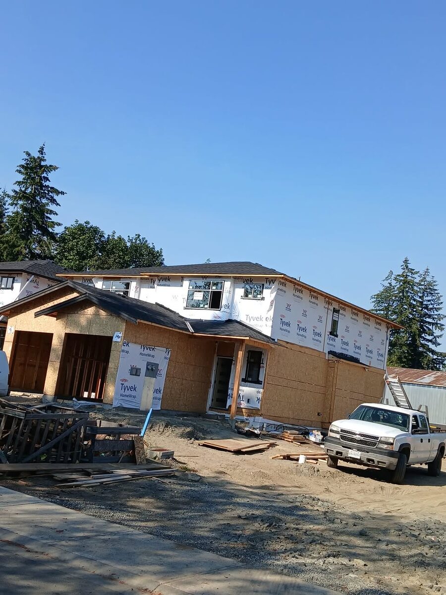 New construction residential building with roof installed