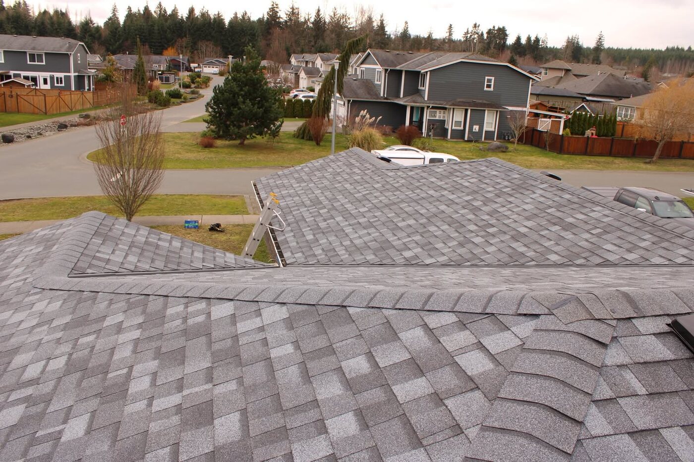 Completed grey architectural asphalt shingle roof